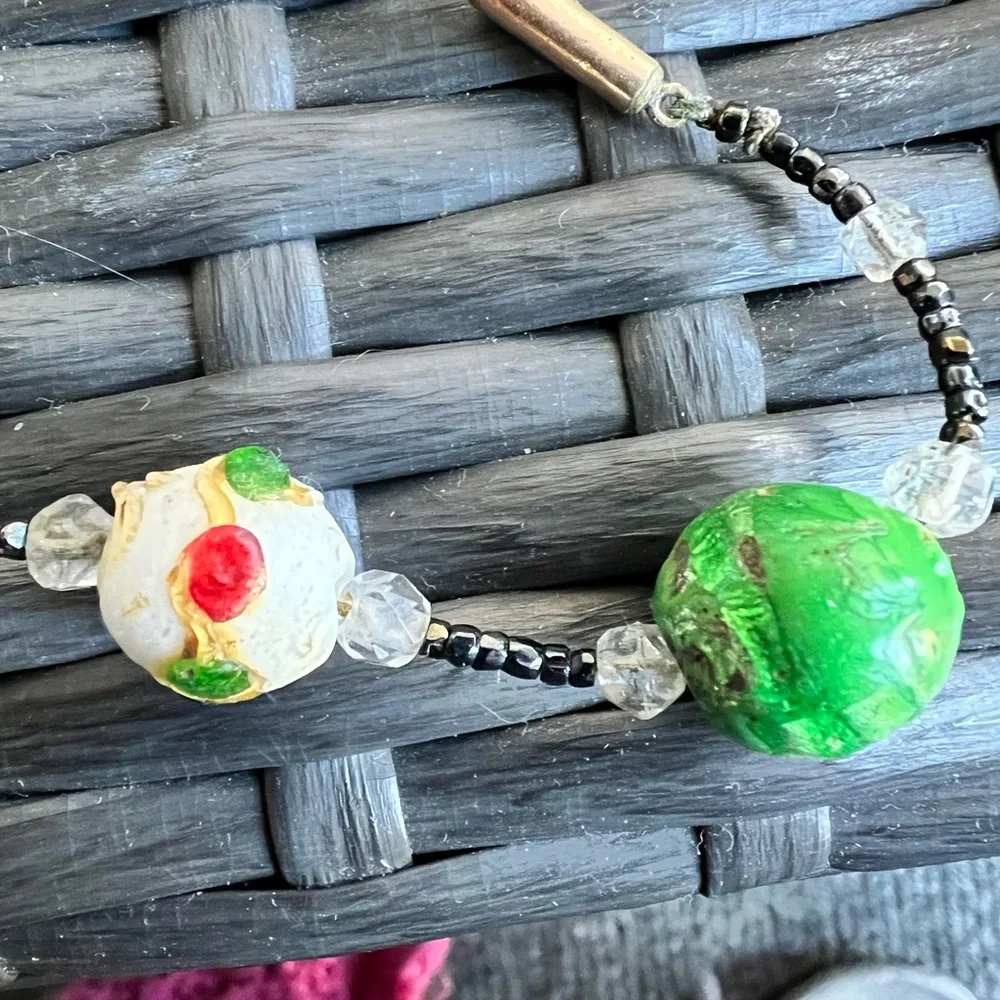 Vintage wedding cake glass beads hand knotted green, cream and red necklace.